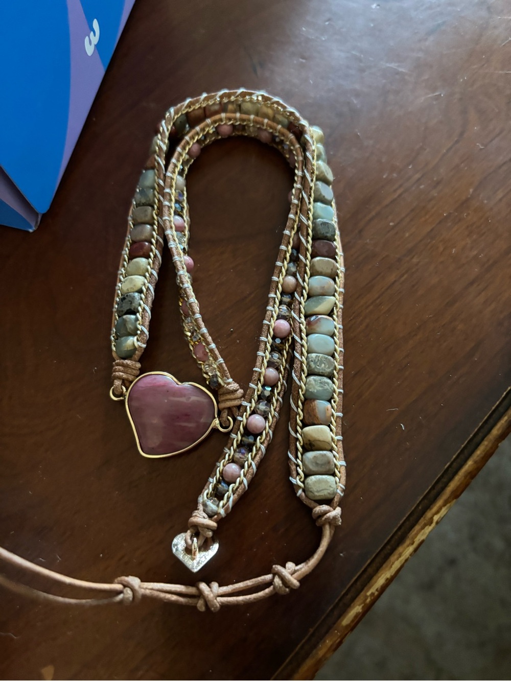 Aura Bloom “True Love’s Rhodonite Heart Wrap” bracelet.